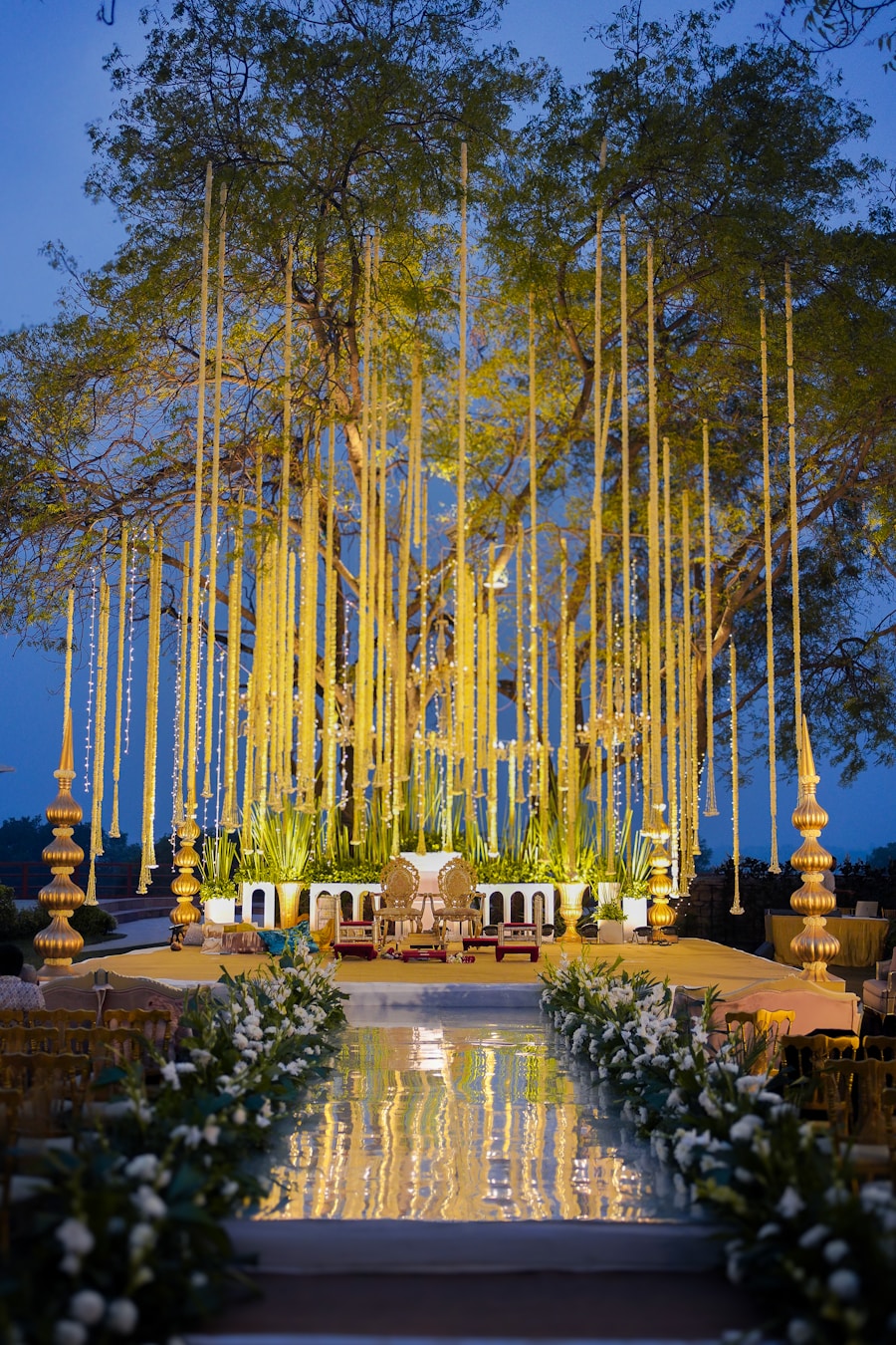 Decorated Indian wedding mandap with marigold and lights